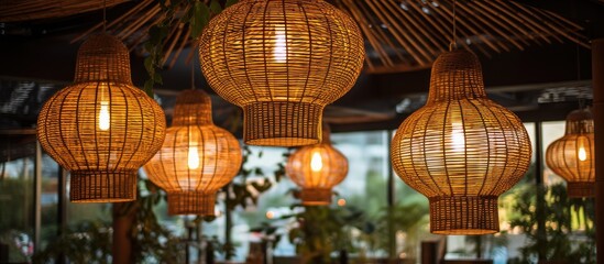 An image showing a detailed view of numerous suspended lights in an indoor space