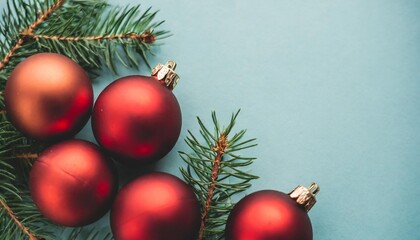 red christmas decorations on a isolated pastel background copy space viewed from above with empty space