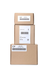 Cardboard packages with shipping labels and barcodes on white background