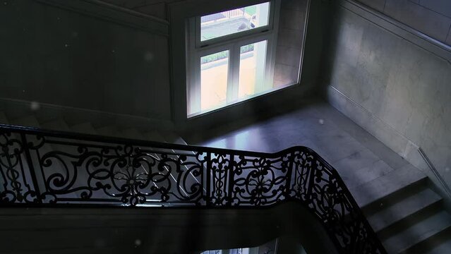 Old Staircase Interior with Natural Light Coming From a Window. 4K Resolution.