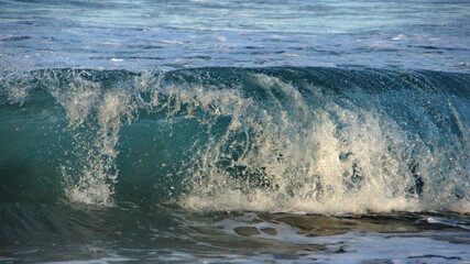 Waves breaking on the beach in Zipolite, Mexico