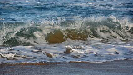 Waves breaking on the beach in Zipolite, Mexico