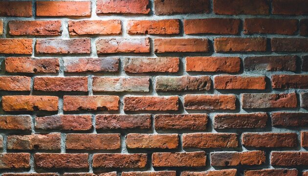 low key photo of red brick wall with lighting effect dark toned color of red brick wall old and grunge brick wall brick wall for background