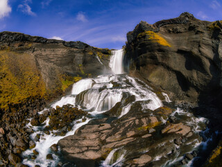 Fototapeta na wymiar waterfall in the mountain Iceland Fish-eye view 