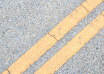 Road Marking -  yellow line on the road texture