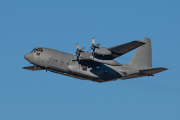 Climbing C-130 Turboprop Aircraft