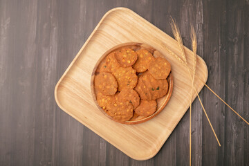 Thattai or Nippattu or Chekkalu is a south Indian deep fried snack made with rice flour prepared during festive and daily common snack.  Thattai is a south Indian fried snack, Spicy and Crispy
