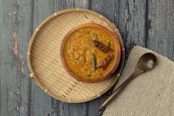 Indian traditional food Mung Dal Tadka Curry served for rice and chapati. Also called Dal Tadka Curry , Dal Sambar, Dal khichadi or Khichdi Tasty Indian recipe made of yellow moong dal.