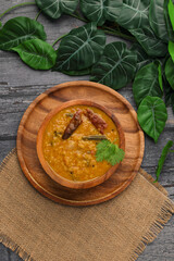 Indian traditional food Mung Dal Tadka Curry served for rice and chapati. Also called Dal Tadka Curry , Dal Sambar, Dal khichadi or Khichdi Tasty Indian recipe made of yellow moong dal.