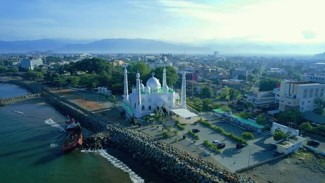 Aerial view at morning of the Al-Hakim Mosque near the coast of Padang City, West Sumatra.