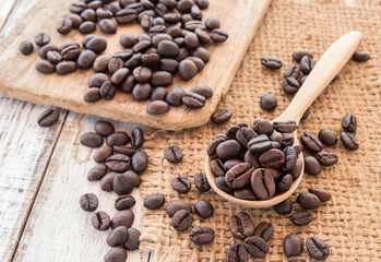Coffee beans on wooden background