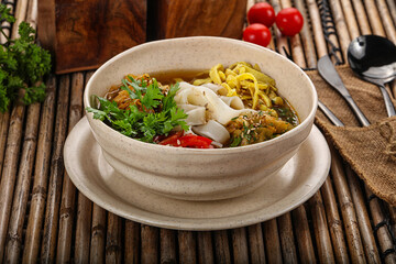 Korean kuksi soup with noodles