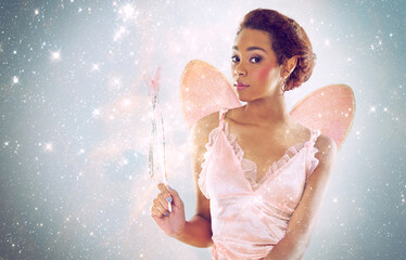 Woman, fairy and magic with glitter in studio portrait for wand, shine and pride with stars on...