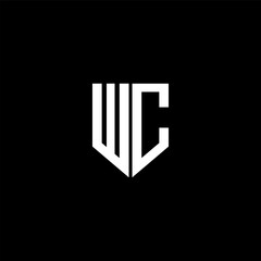 WC letter logo design with black background in illustrator. Vector logo, calligraphy designs for logo, Poster, Invitation, etc.