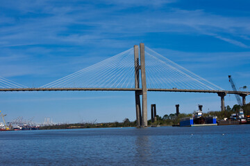 Talmadge Memorial Bridge over the river with a blue sky