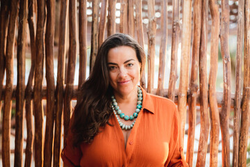 Woman posing in tropical setting