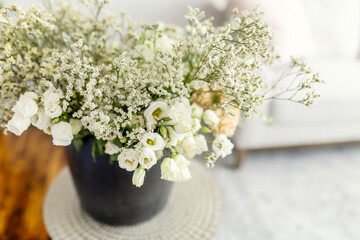 Fototapeta na wymiar Overhead image of white and green floral arrangement