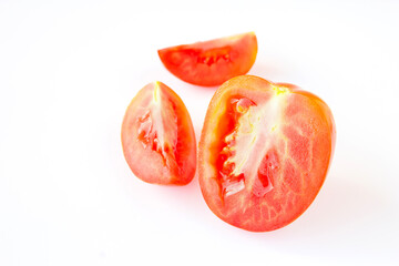 Red tomatos  on a white background