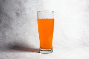 Fresh orange juice glass, isolated on white background