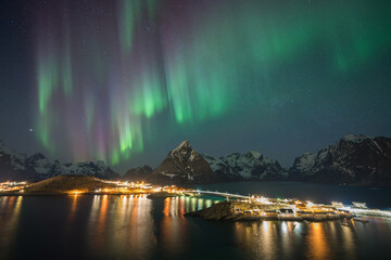 Top view of Reine on the hill with a beautiful sky and northern light 