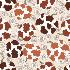 Groovy western Halloween cow spots printed pumpkin among daisy flowers vector seamless pattern. Hand drawn retro October 31 holiday howdy wild west aesthetic floral background. - 765432361