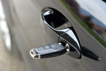 Car key inserted in lock - 765443359