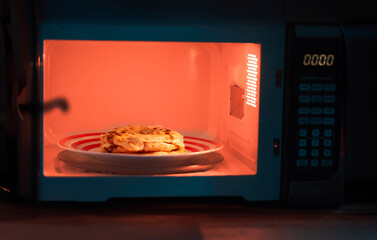 Delicious cheese pupusas, warmed to perfection in a microwave oven, ready to satisfy your cravings in minutes