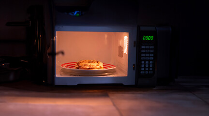 Delicious cheese pupusas, warmed to perfection in a microwave oven, ready to satisfy your cravings...