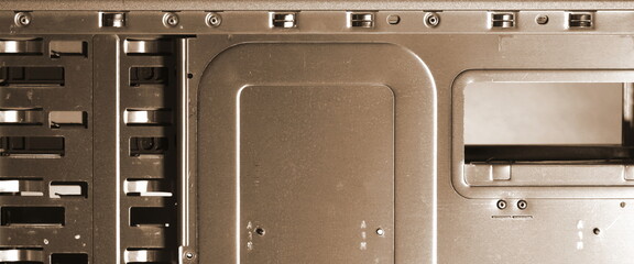 Metal computer case close-up. Computer Accessories Conception. Digital Wallpaper