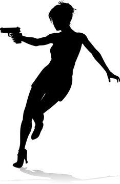 An action hero female movie star woman in silhouette. In a hitman, spy or secret agent detective type role halding a hand gun.