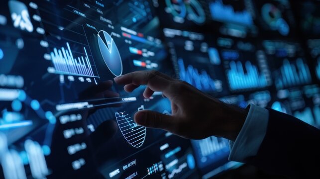 Man in suit using interactive high-tech system to study advanced digital graphs for business analytics