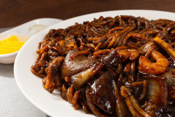 Platter Jjajangmyeon with stir-fried noodles in Jjajang sauce