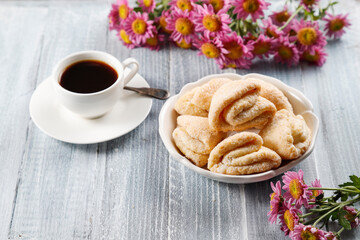 Homemade nut shaped russian soviet cookies and wafer rolls with pastry cream.