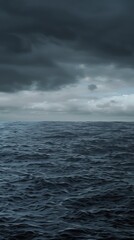 Obraz premium photo of rainy dark cloudy day in dark gray tones at the calm sea in dusk