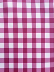 The gingham pattern on a magenta and white background