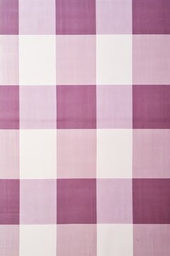 The gingham pattern on a mauve and white background