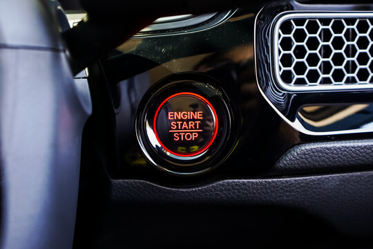 Close up engine car start button. Start stop engine modern new car button,Makes it easy to turn your auto mobile on and off. a key fob unique ,selective focus	
