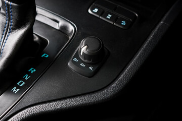 automatic transmission shift selector in the car interior. Closeup a manual shift of modern car gear shifter.	