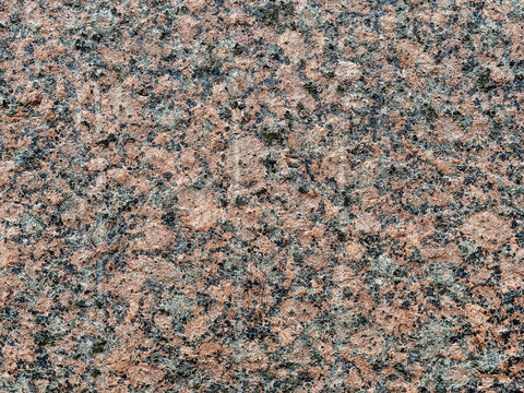 Granite rock surface close up. Texture background for design.
