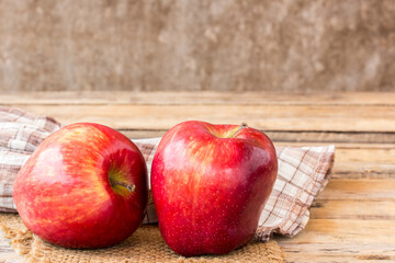 fresh red apple on wooden table