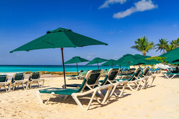 beach chairs and umbrella