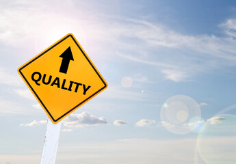 Text for EXCELLENCE on yellow road sign