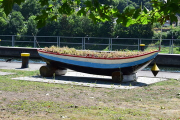 boat with the flag of Luxembourg colors