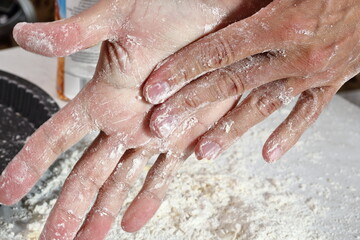 Chef cleaning hands from dough remains. Making Treacle Pie Series.