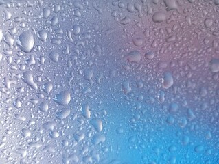 water drops on blue red background 