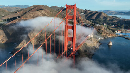 Golden Gate Bridge Aerial At San Francisco In California United States. Megalopolis Downtown Cityscape. Vehicles Travel. Golden Gate Bridge Aerial At San Francisco In California United States. 