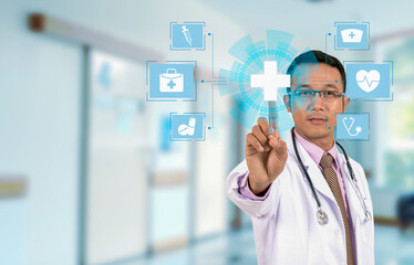 Doctor hand touching the first aid sign on the hospital background, healthcare and hospital concept.