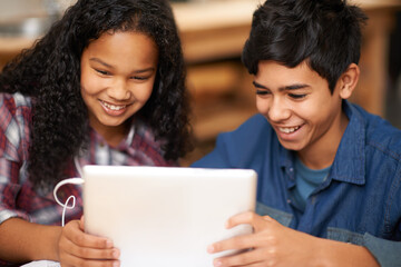Students, boy and girl with tablet in classroom for elearning, educational video and online assessment with smile. School kids, friends and happy with technology for knowledge or learning on internet