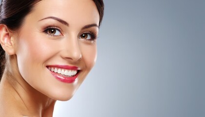 Fototapeta premium A woman with a smile on her face and her hair in a ponytail looks lovely