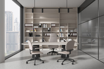Stylish office interior with work desk and shelf with folders, panoramic window